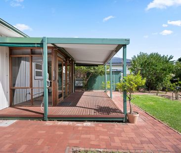 Character Home with Expansive North-Facing Rear Yard - Photo 6