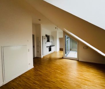 Helle 2-Zimmer-Dachgeschosswohnung in Arheilgen ab sofort frei - Foto 1