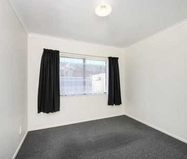 Charming 2BR Unit - Photo 2