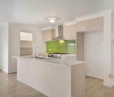 4-Bedroom Home with Multiple Living Areas - Photo 6