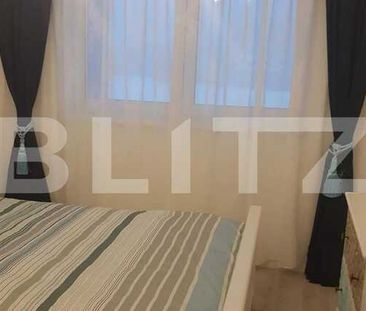 Apartament cu 2 camere, 56 mp , modern, loc de parcare, aer conditionat, zona strazii Trifoiului - Photo 2