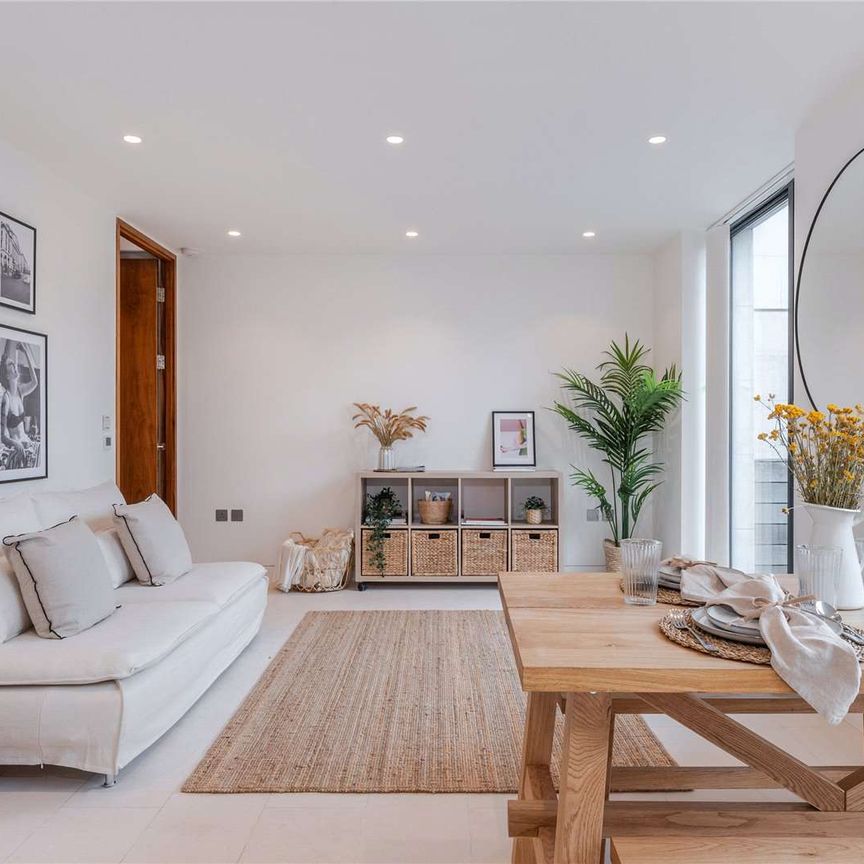 An interior designed, two-bedroom apartment in this modern & popular development. - Photo 1