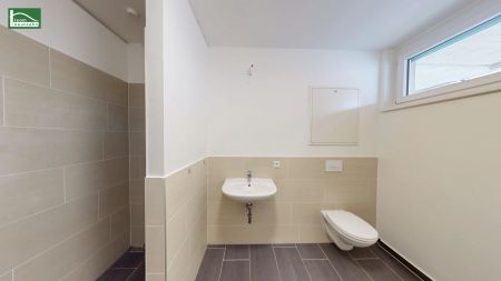 Moderne Erdgeschosswohnung mit Freifläche in zentraler Lage! - Foto 5