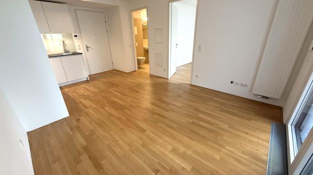 Rechtzeitig zum Sommerbeginn frei!!!! Super-schicke Neubauwohnung mit EIGENGARTEN! - Foto 1