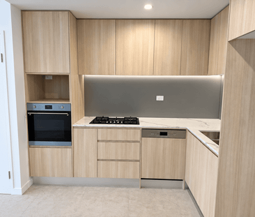 Brand-New Two-Bedroom Apartment with Balcony and Courtyard Outlook - Photo 3