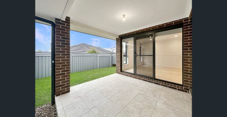Modern 4 Bedroom Duplex Home in the Kembla Grange Estate - Photo 2