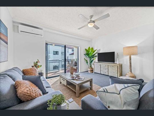 BEACHSIDE FURNISHED TOWNHOUSE APARTMENT - Photo 1