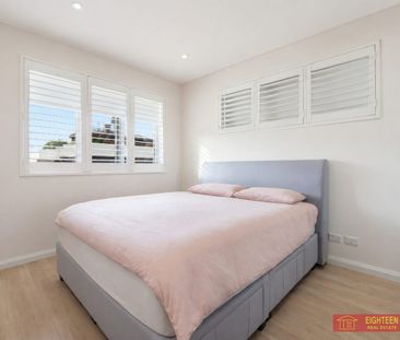 Sun-Filled North-Facing 3-Bedroom Home with Exceptional Space and Convenience - Photo 2