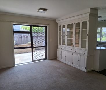 Discover comfort and convenience in this four-bedroom, two-bathroom... - Photo 2