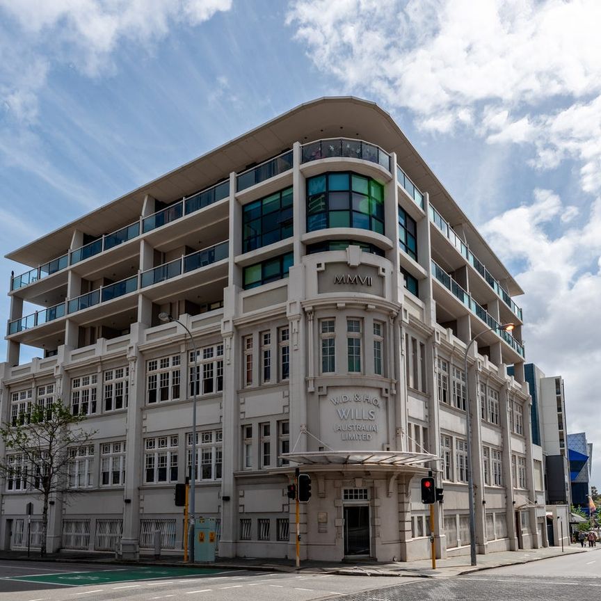 Boutique City Living with Historic Charm & Modern Luxury - Photo 1