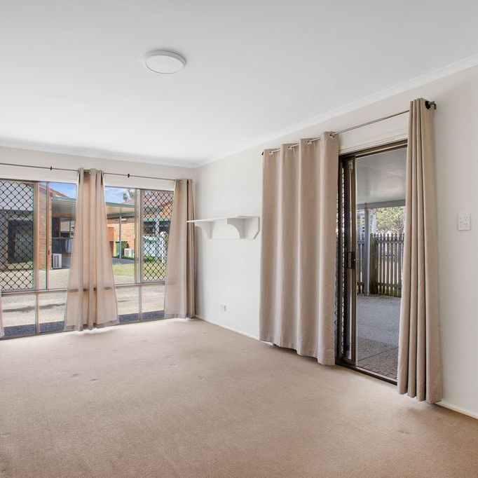 Neat and Tidy Apartment in Beachside Complex - Photo 1