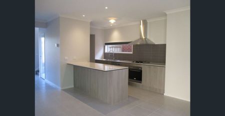 Modern 4-Bedroom Family Home - Photo 4