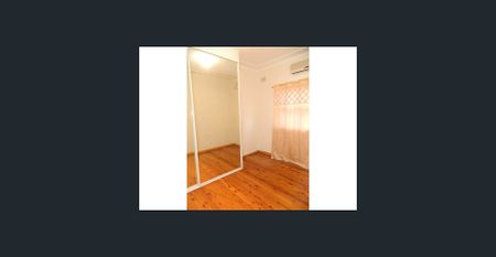 Spacious Family Home with Great Outdoor Living in Lurnea - Photo 3