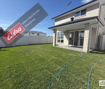 Brand New 4-Bedroom Family Home - Photo 1