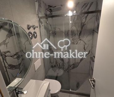 Erstbezug! Stilvolle 3-Zi KfW Neubauwohnung in Toplage von Rüdeshei... - Photo 3