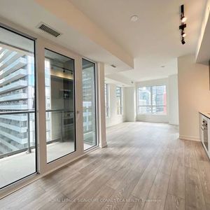 Stunning 3-Bedroom Corner Unit with Panoramic City Views! - Photo 2