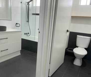 Renovated Unit with Ocean Glimpses - Photo 3