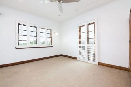 Elegant Stucco Double Brick Home with Character and Modern Comfort - Photo 4