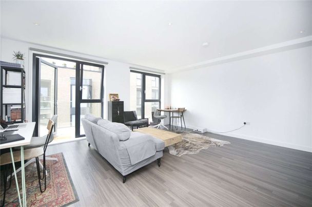 Spacious one bedroom apartment with a south facing balcony in the popular Mettle & Poise development. - Photo 1