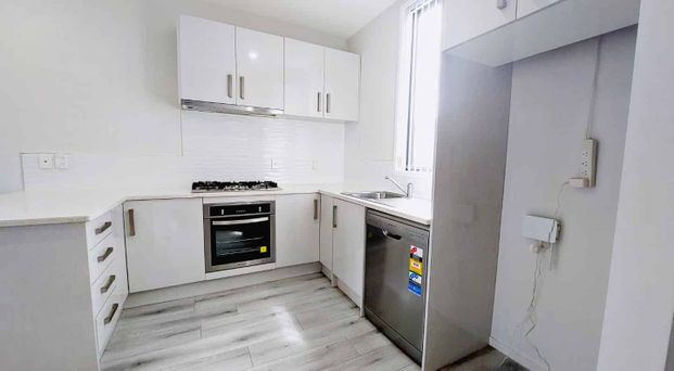 Trendy near new terraced home - Photo 1
