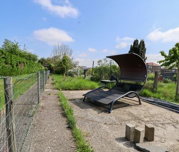 Leuke rijwoning met zij-ingang naar grote tuin - Photo 6