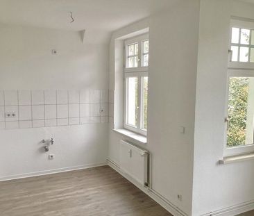 Dachgeschosswohnung mit Charme - Foto 1