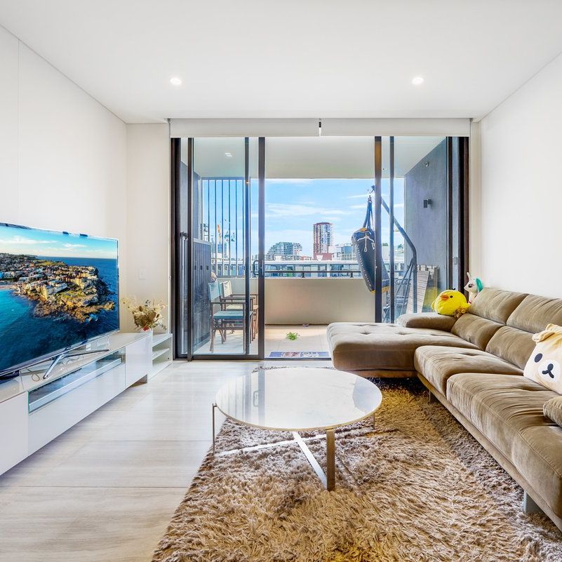 Light-Filled Interiors I Modern, Furnished, & Spacious I Walk to East Village - Photo 1