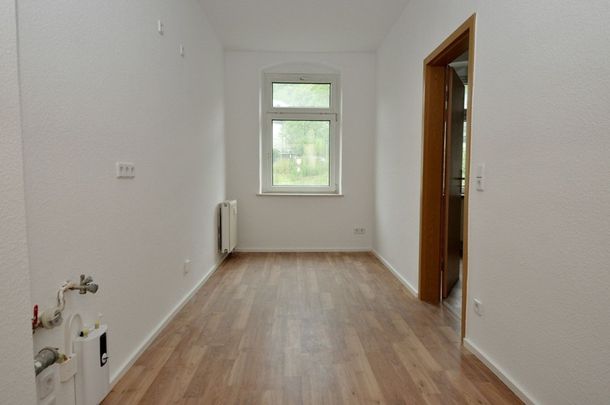 Sanierte 3-Raum-Wohnung mit Balkon im Zentrum - Foto 1