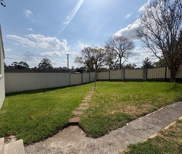 Comfortable Family Home with Spacious Yard - Photo 6
