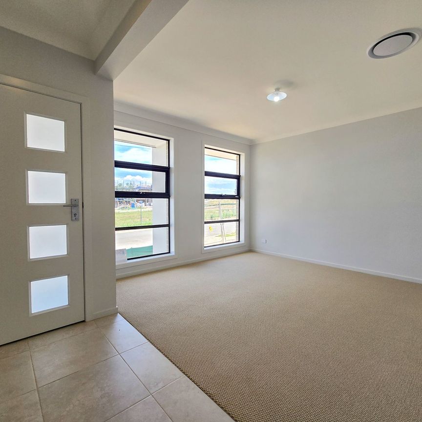 Brand New Family Living in a Prime Oran Park Pocket - Photo 1