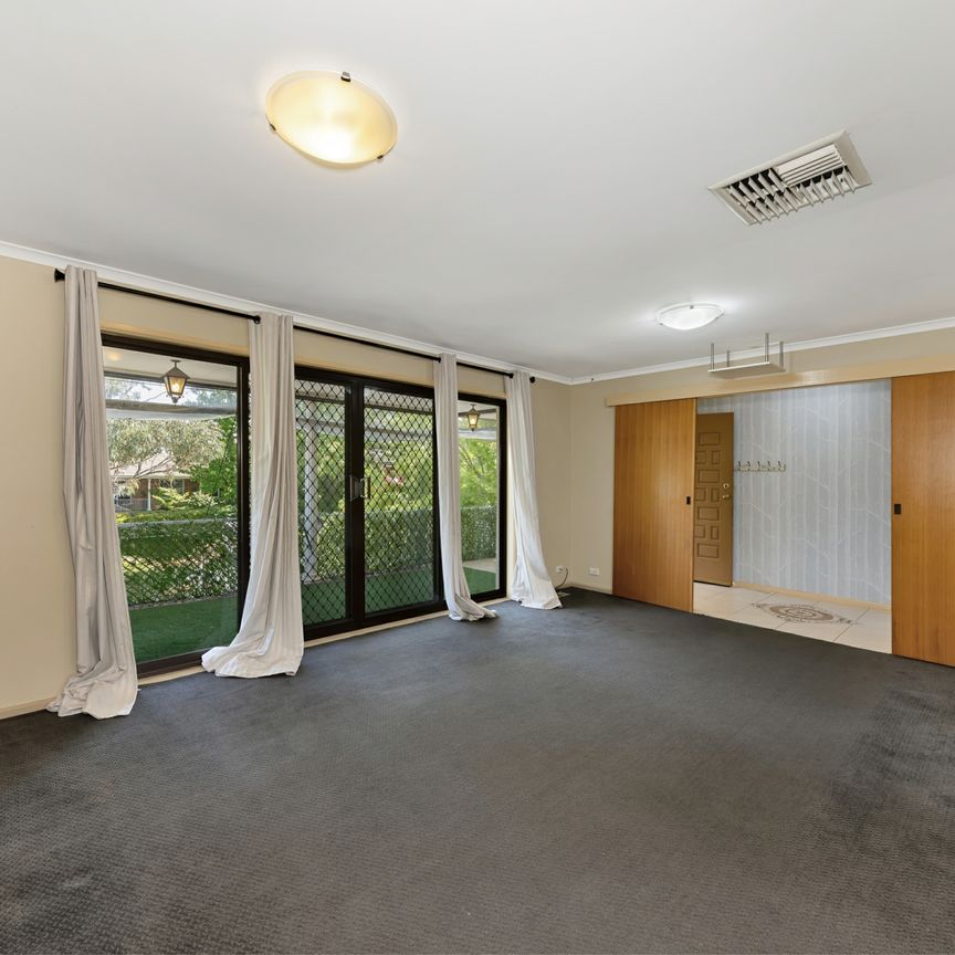 Family Home with Pool, Solar & Expansive Gardens in a Prime Location - Photo 1