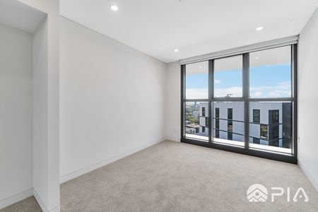 Top Level with good views, Spacious & Modern 2-Bedroom Apartment in Prime Homebush Location! - Photo 5