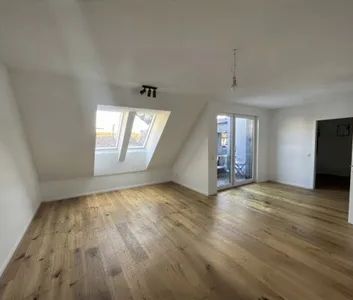 Moderne Wohnung mit Dachterrasse und Schrankraum in exzellenter urbaner Lage! - Photo 1