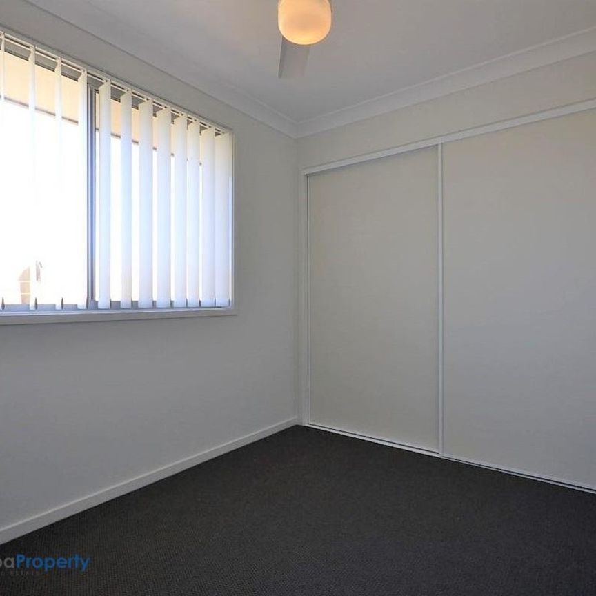 Modern three bedroom unit, close to amenities. - Photo 1