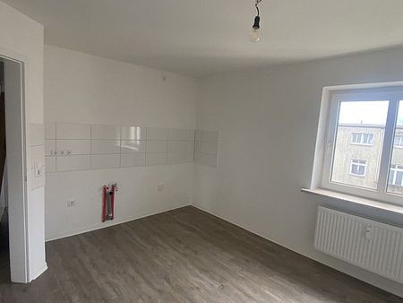 Gemütliche 2-Zimmer-Dachgeschosswohnung - Foto 2