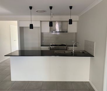 Stylish Low Maintenance Family Home - Photo 4