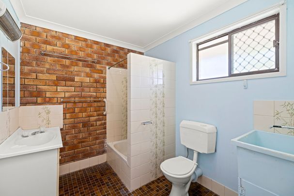 Two Bedroom Unit in Convenient Location - Photo 1