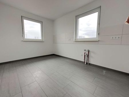 Ansprechende Maisonette-Wohnung mit Balkon | Fußbodenheizung | Stellplätzen | Luft-Wärme-Pumpe - Photo 2