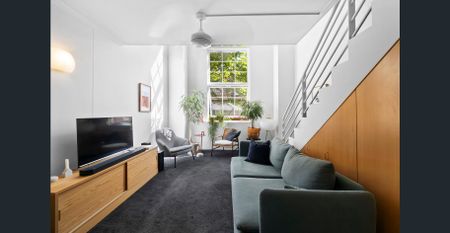 Bright & Spacious Split-Level Apartment Filled with Natural Light - Photo 3