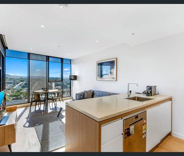 Furnished Modern 1-Bedroom Apartment in the Iconic FV “Flatiron” Tower - Photo 2