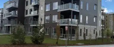 2 Bed + Den | 2 Bath | 1 Parking | 700 Shawnee Court Southwest, Calgary - Photo 1
