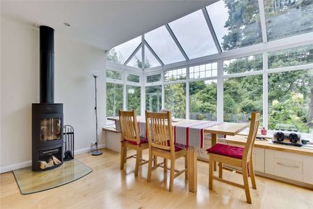 A well presented five bedroom detached family house situated in a quiet cul de sac just 0.6 of a mile from Cobham & Stoke d'Abernon station - Photo 3