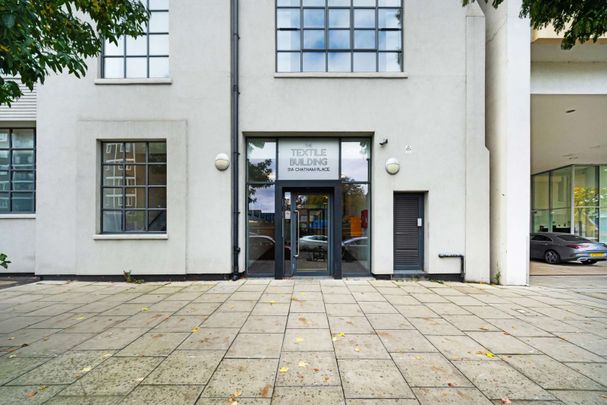 Stunning two bedroom apartment with the large windows, tall ceilings and open interiors in this landmark factory conversion in the Hackney Fashion Hub. - Photo 1