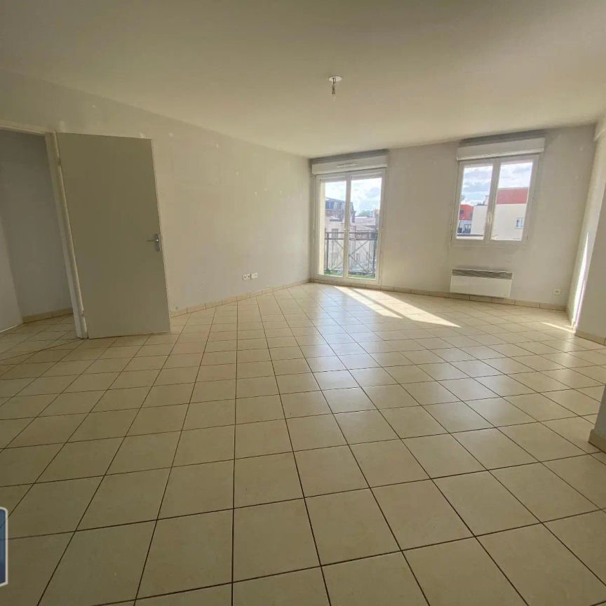 Appartement à louer 4 pièces 76.8m² - Photo 1