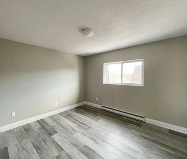 Boxwood Place Apts - PARKING SPACE & WATER INCLUDED - Photo 6