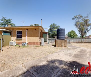 A well-maintained and practical home offering comfortable living wi... - Photo 3