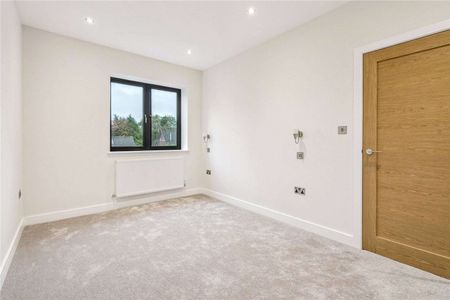 A beautifully designed, brand-new home perfectly positioned in a peaceful and tucked-away setting - Photo 4