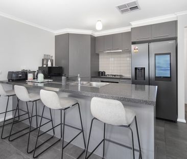 Stunning Family Home with Modern Features in Miners Rest - Photo 3