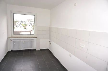 Klassische 3-Zimmer-Wohnung mit Loggia in zentraler Lage von Leverkusen-Schlebusch! - Photo 4