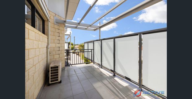 Stylish & Secure Apartment in Prime Location - Photo 1